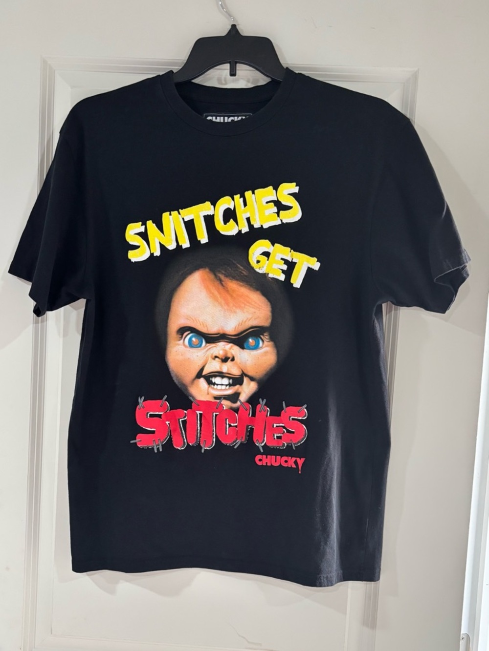Kids Black Short-Sleeve Graphic Tee - Chucky "Snitches Get Stitches"